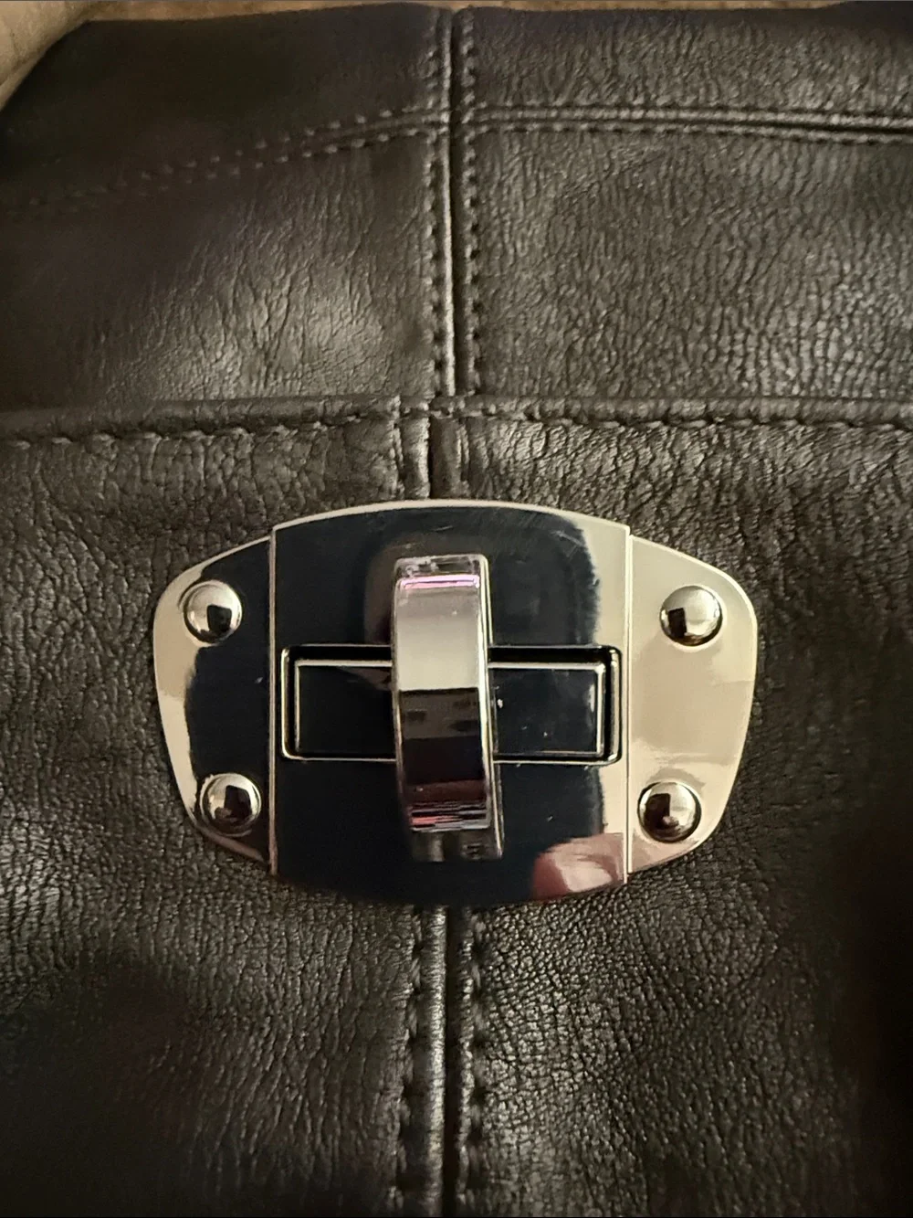 Classic Black Leather Satchel with Cream Handles